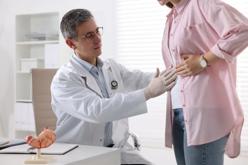 Private gastroenterologist consulting a patient (placeholder)